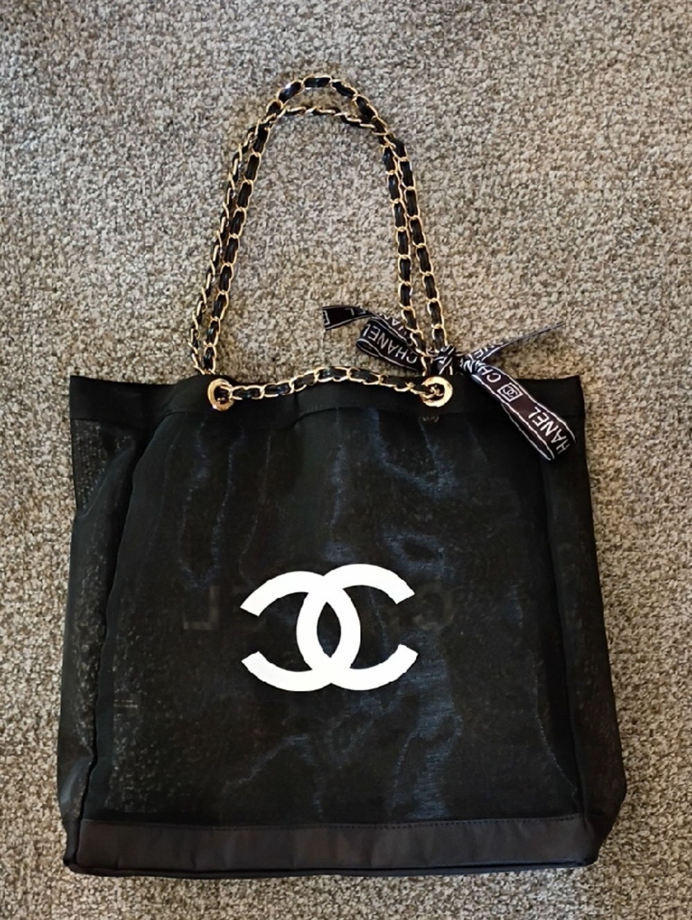 CHANEL Black Mesh Tote with White CC Logo and Gold Chain Handles